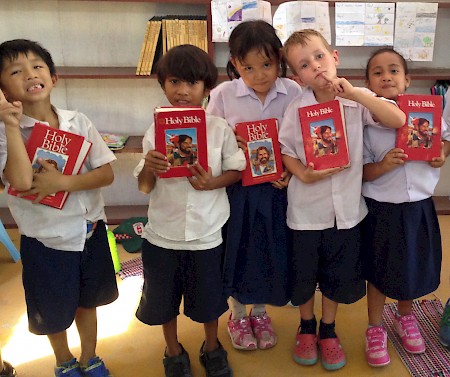 TAIS first-graders received their first classroom bibles in November 2015 thanks to the generosity of an Adventist school in California. [Photo by Stephanie Haddad.]